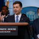 Transportation Secretary Pete Buttigieg (C) speaks during a news conference marking six months since the signing of the bipartisan infrastructure bill with Environmental Protection Agency Administrator Michael Regan (L) and National Economic Council Director Brian Deese in the Brady Press Briefing Room at the White House on May 16, 2022, in Washington, DC.